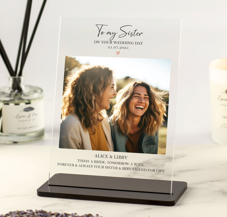 Personalised wedding day photo plaque gift from sibling to sister featuring heartfelt message and custom photo, printed on clear acrylic with black stand.