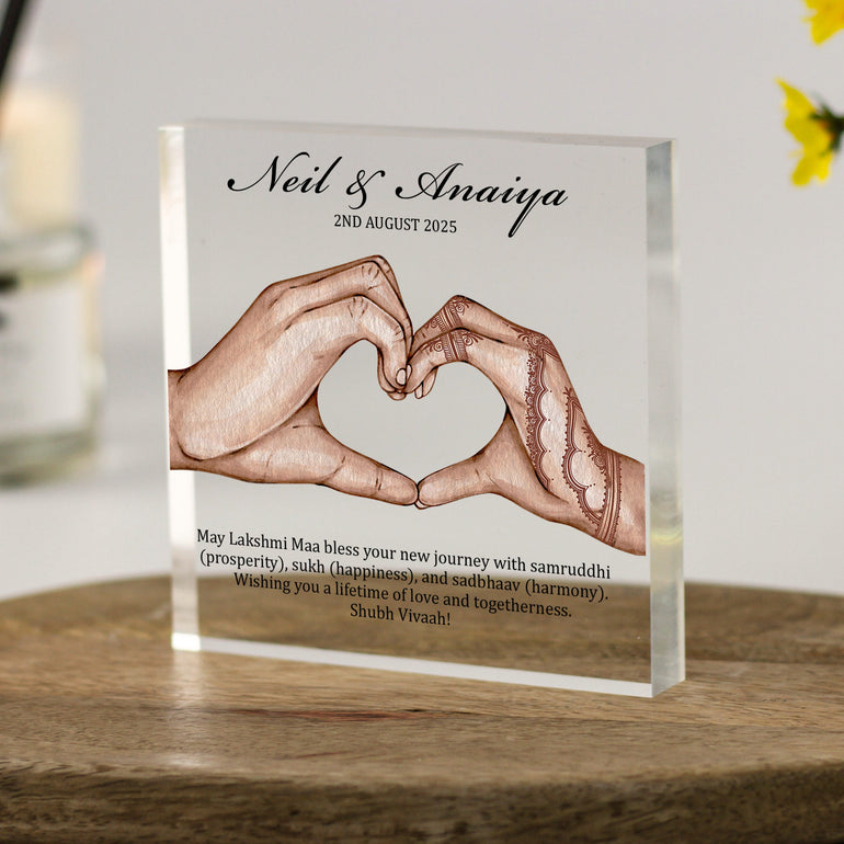 Personalised Indian couple acrylic block with mehndi hand illustration forming a heart, custom names, date, and Gujarati wedding blessing.