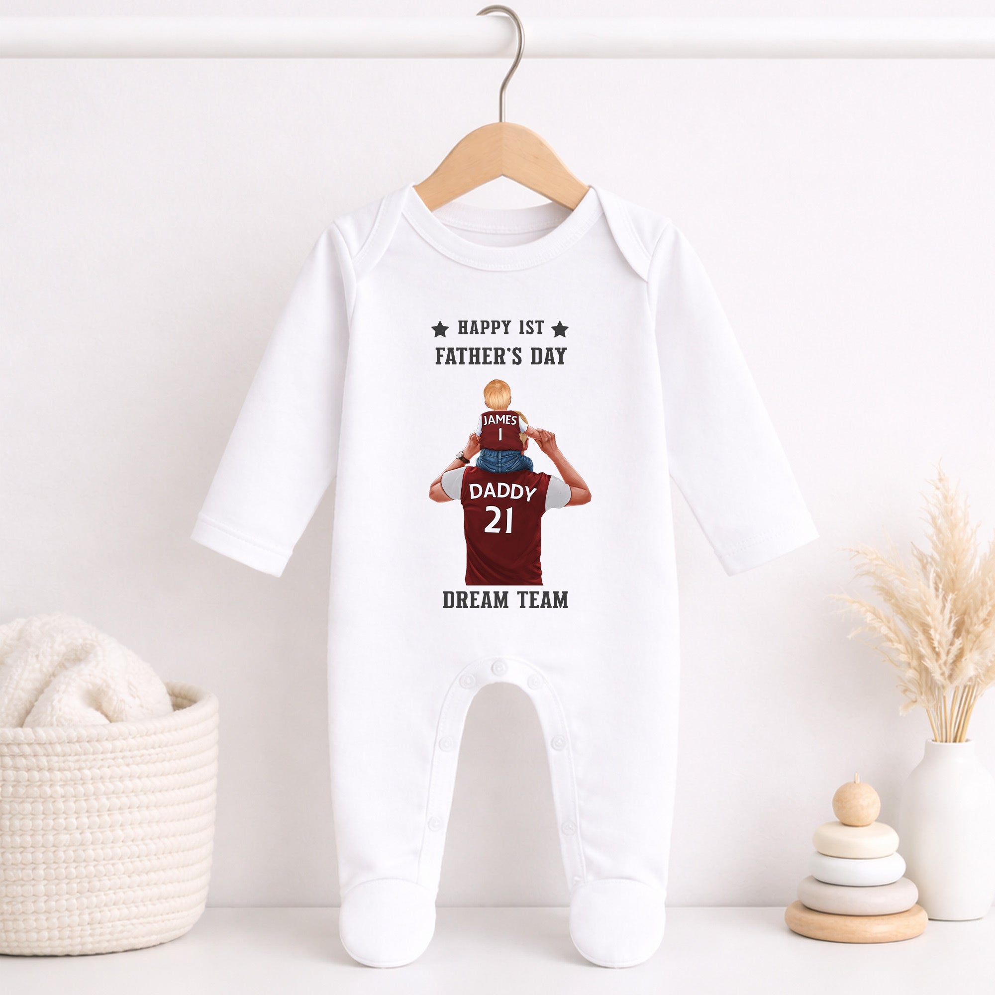 Personalised 1st Father’s Day football baby outfit with smaller child on daddy’s shoulders and matching team colour shirts