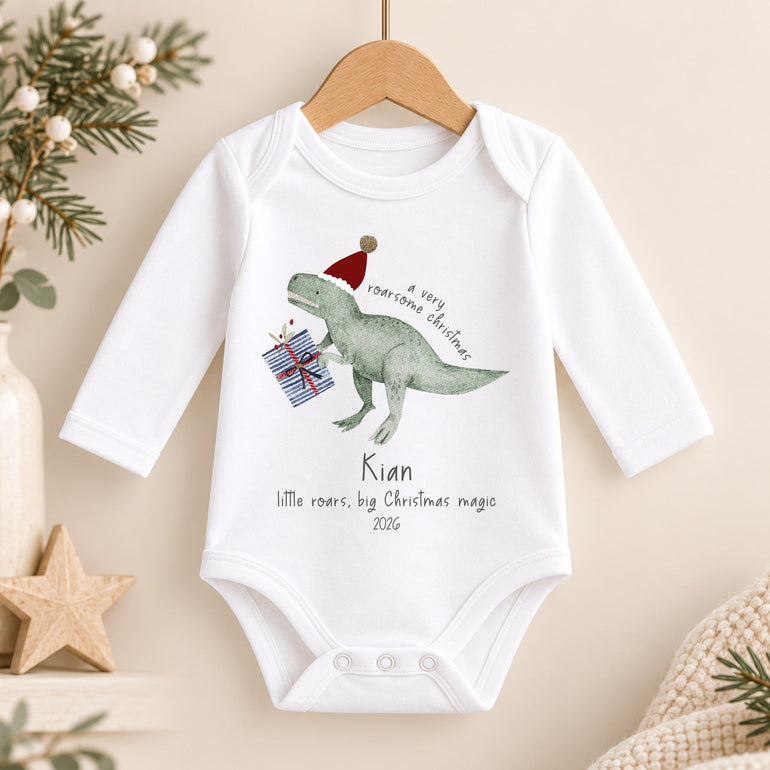 Personalised dinosaur Christmas long-sleeve baby vest with child’s name, year, Santa hat dinosaur and presents