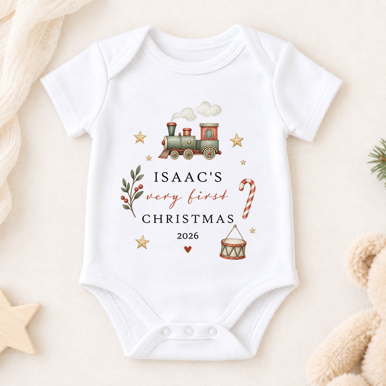 Personalised Very First Christmas short-sleeve baby vest with Christmas train, child’s name and year