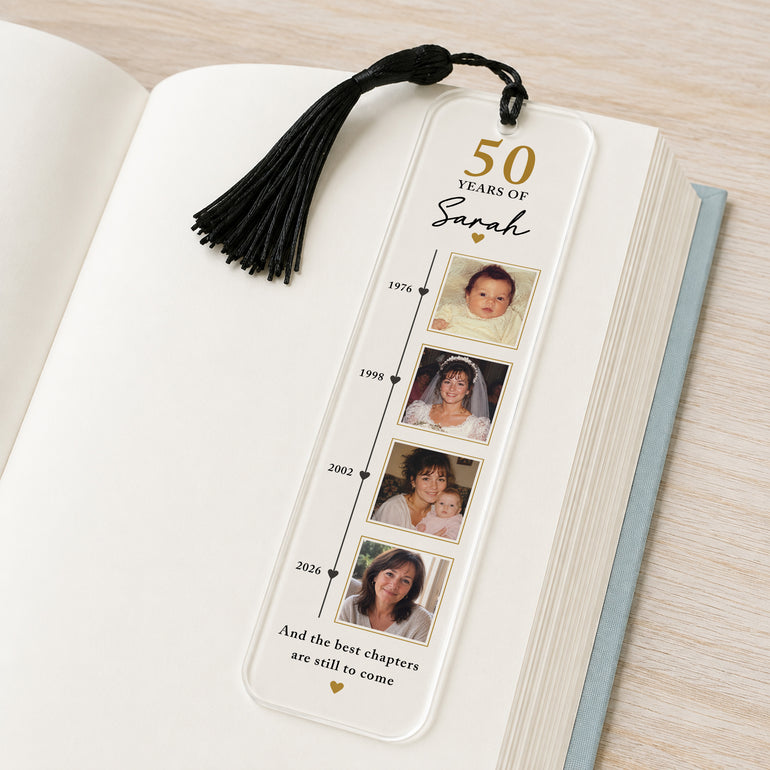 Personalised 50th birthday photo bookmark showing four life timeline photographs, milestone years, recipient name and black tassel.