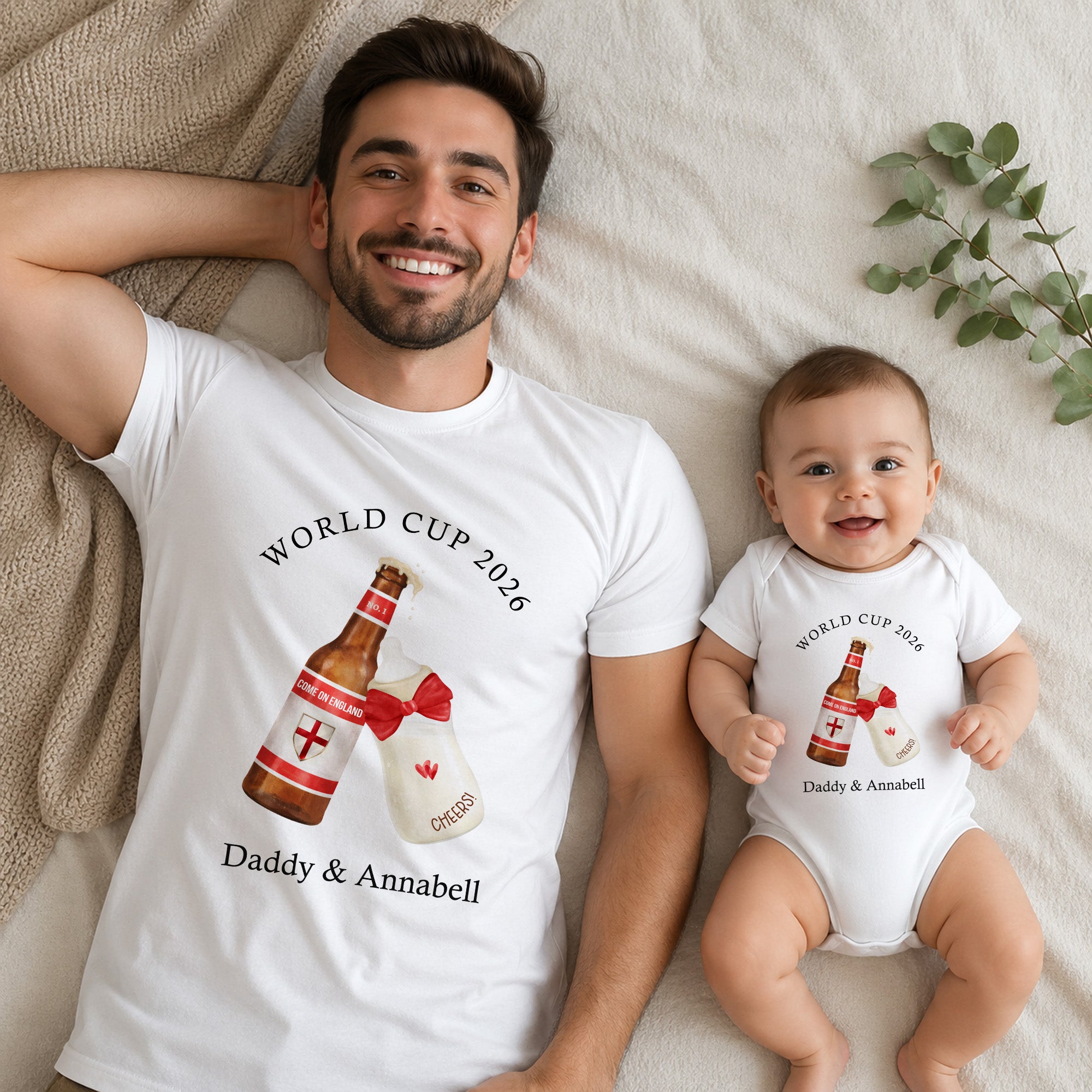 Matching Daddy and baby England World Cup outfit with adult T-shirt and baby vest