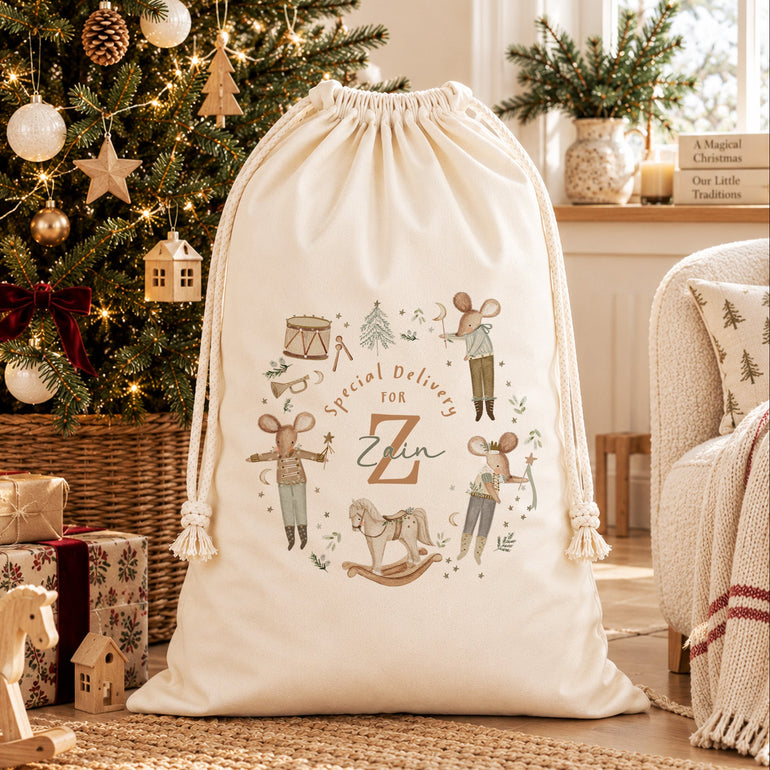 Personalised cream Christmas Eve sack with woodland mice Special Delivery design, large initial and child’s name.
