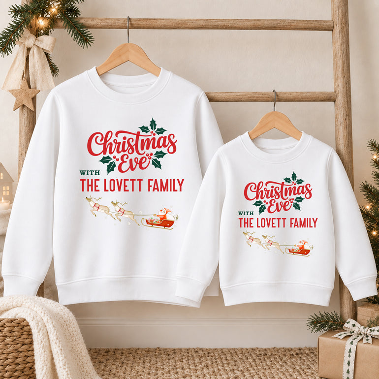 White Christmas Eve with The Family jumper with surname and Santa's sleigh, alternative view