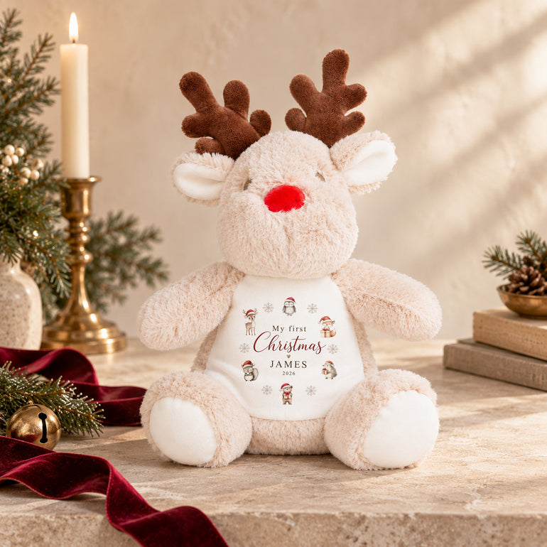 Personalised Christmas reindeer soft toy with woodland animals, My First Christmas wording and example name James with year 2026