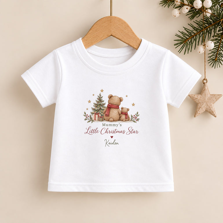 Personalised Mummy’s Little Christmas Star kids T-shirt with teddy bears beside a Christmas tree and child’s name
