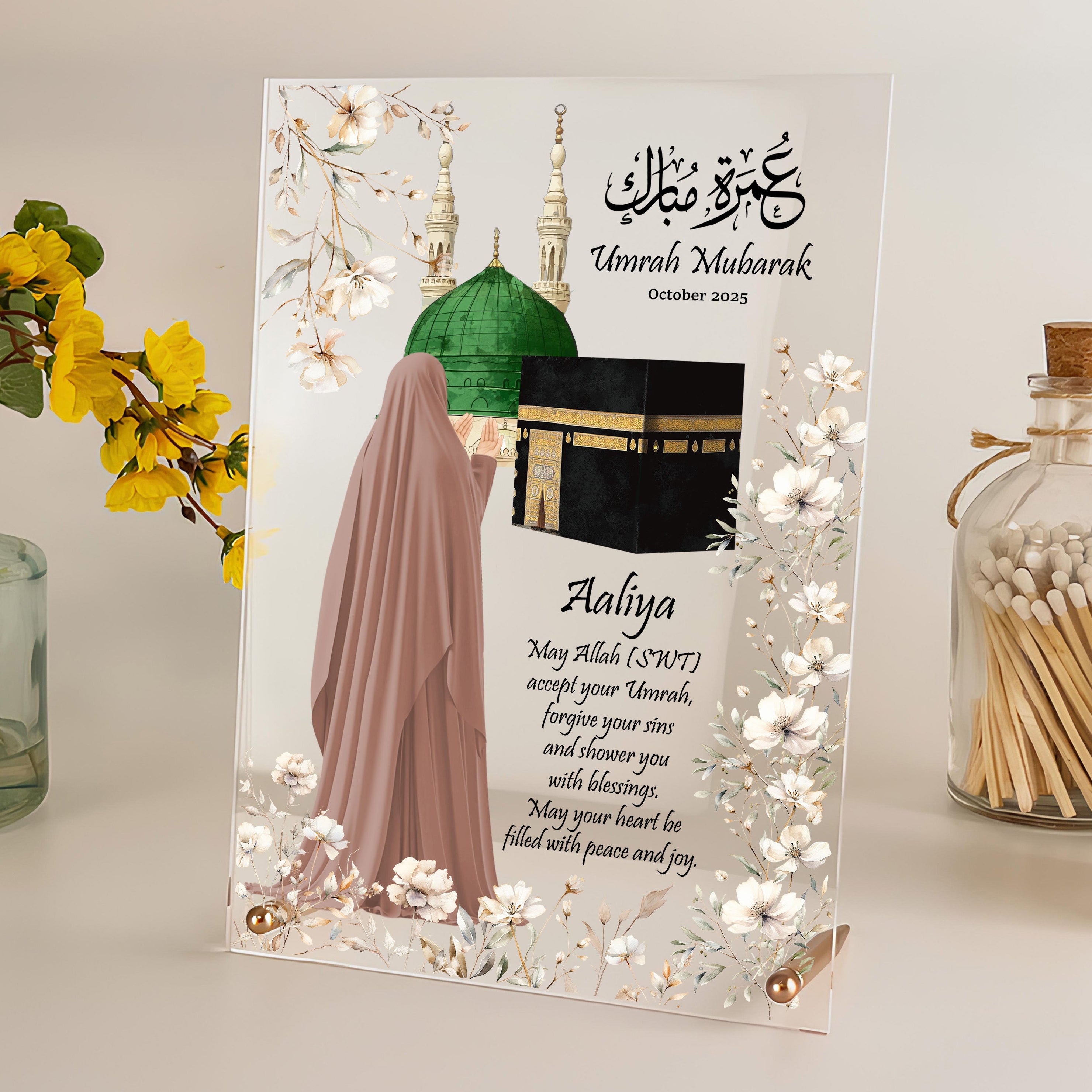 Personalised Umrah or Hajj acrylic plaque with hijabi woman illustration, mosque and floral design, displayed with rose gold support rods – Islamic gift for her