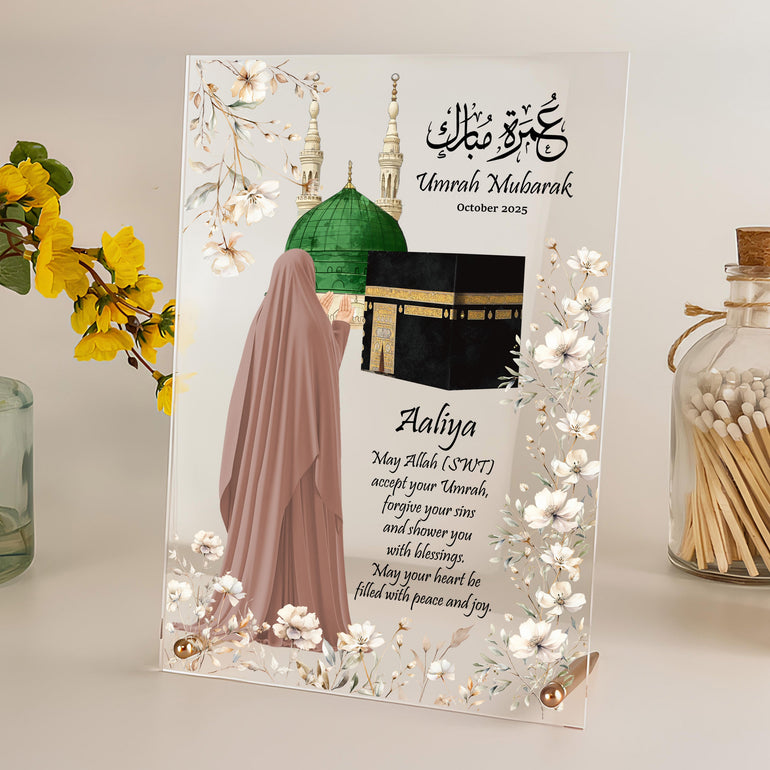 Personalised Umrah or Hajj acrylic plaque with hijabi woman illustration, mosque and floral design, displayed with rose gold support rods – Islamic gift for her