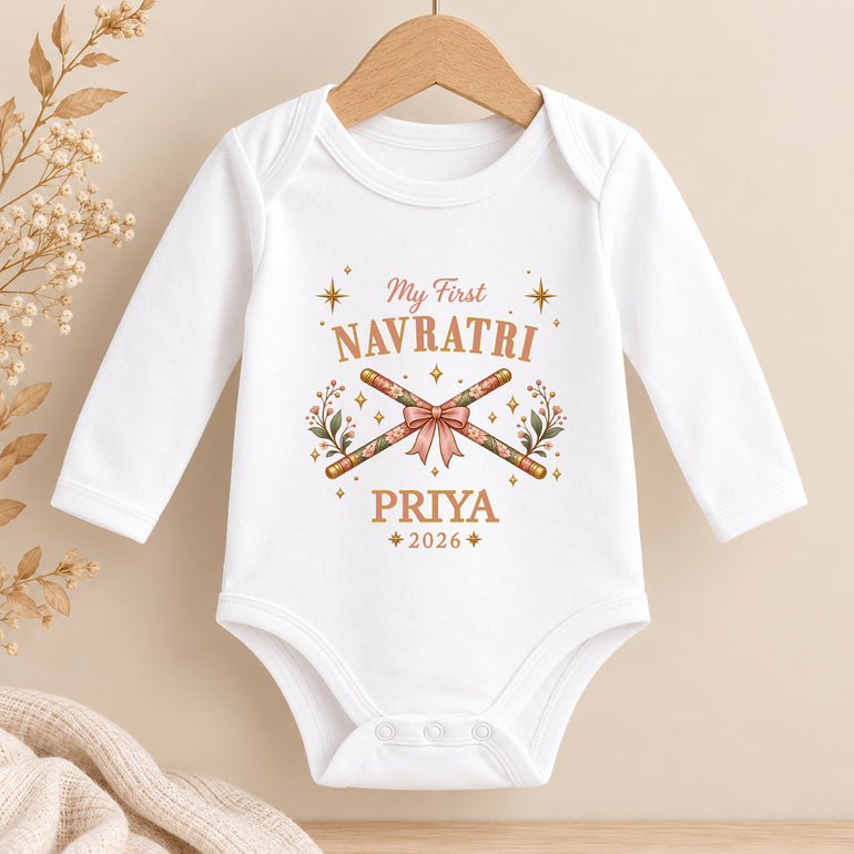 Pink design: Personalised My First Navratri baby vest with pink bow, dandiya sticks, name and year
