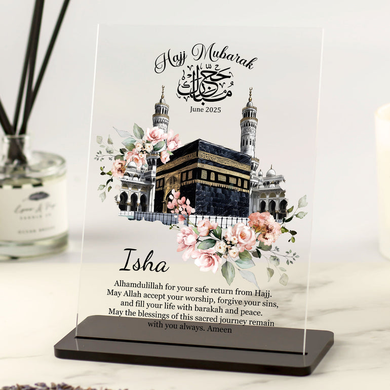 Personalised Hajj Mubarak acrylic plaque with Kaaba illustration, floral decoration, and custom name and dua message – Islamic gift for Hajj or Umrah return.