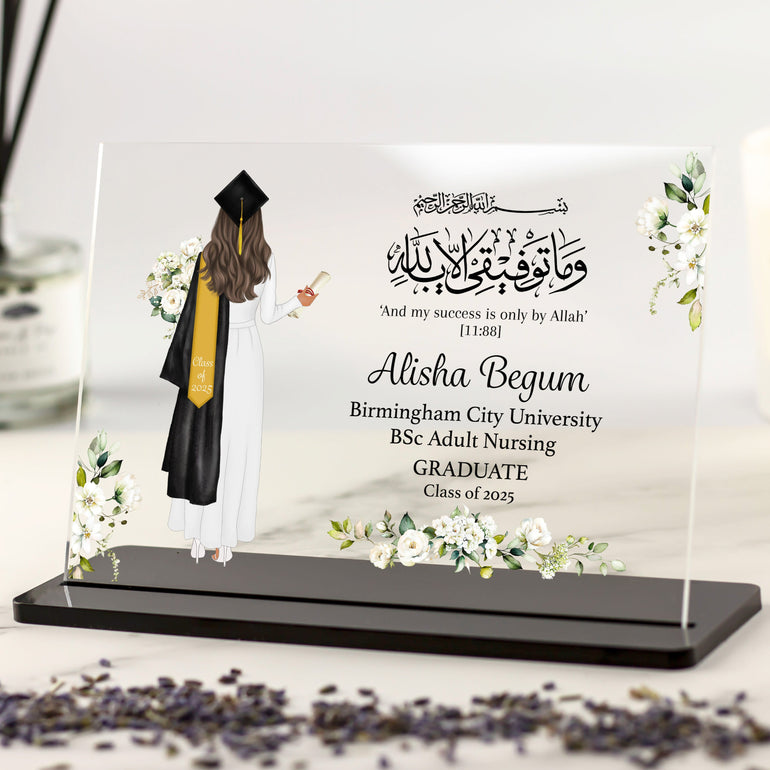 Personalised Islamic graduation plaque for her with floral design, Arabic Quran quote, and customisable graduate character wearing robe and hijab.