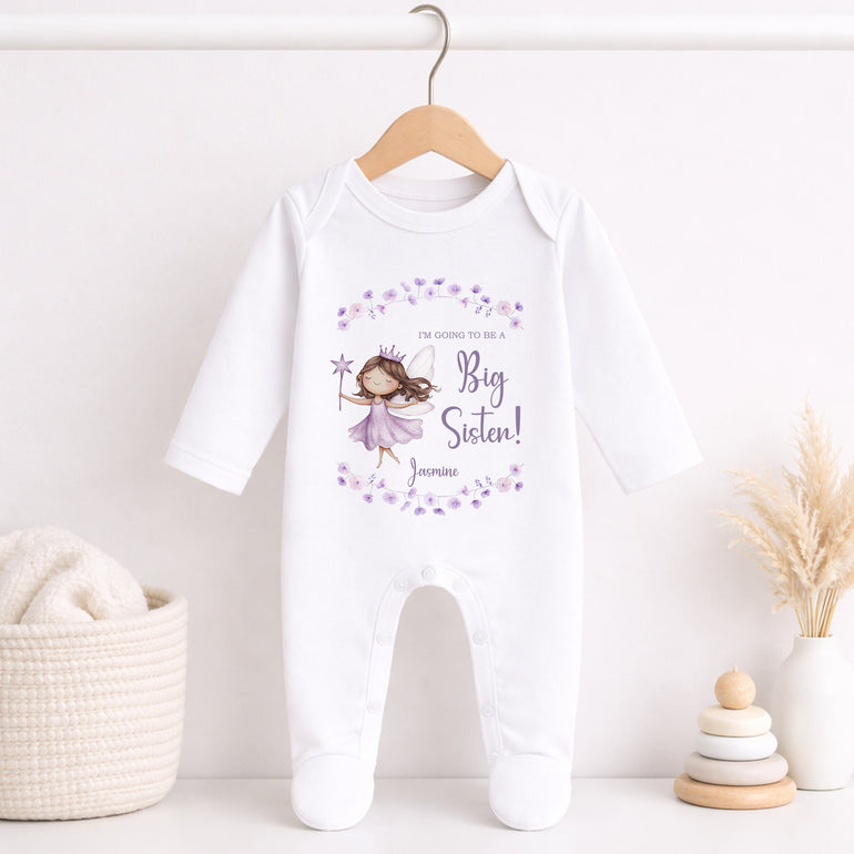Personalised big sister baby grow with long sleeves, lavender fairy artwork and custom name for a baby announcement outfit.