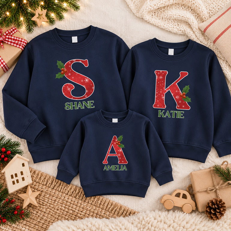 Snowflake Christmas jumper with red snowflake initial, holly and name, alternative view