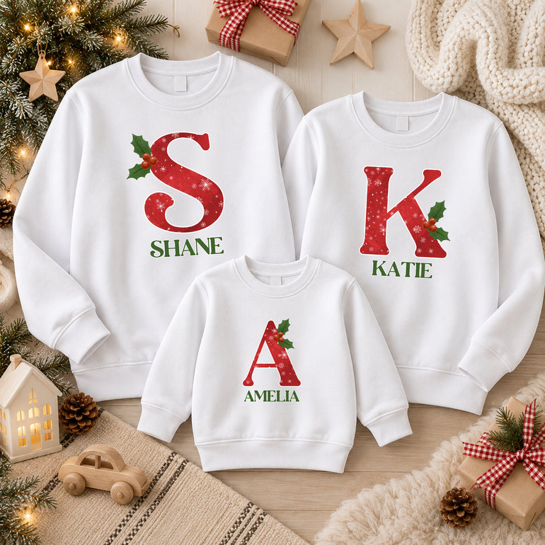 Snowflake Christmas jumper with red snowflake initial, holly and name, alternative view