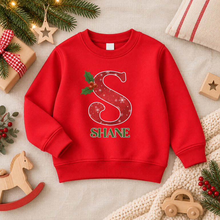 Snowflake Christmas jumper with red snowflake initial, holly and name, alternative view