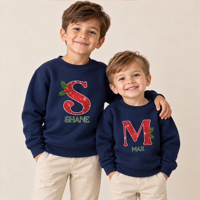 Snowflake Christmas jumper with red snowflake initial, holly and name, alternative view