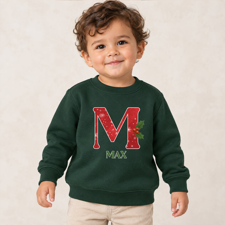 Snowflake Christmas jumper with red snowflake initial, holly and name, alternative view