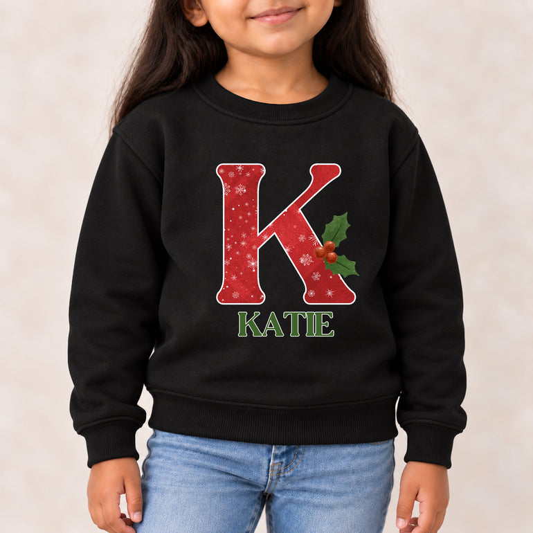 Snowflake Christmas jumper with red snowflake initial, holly and name, alternative view