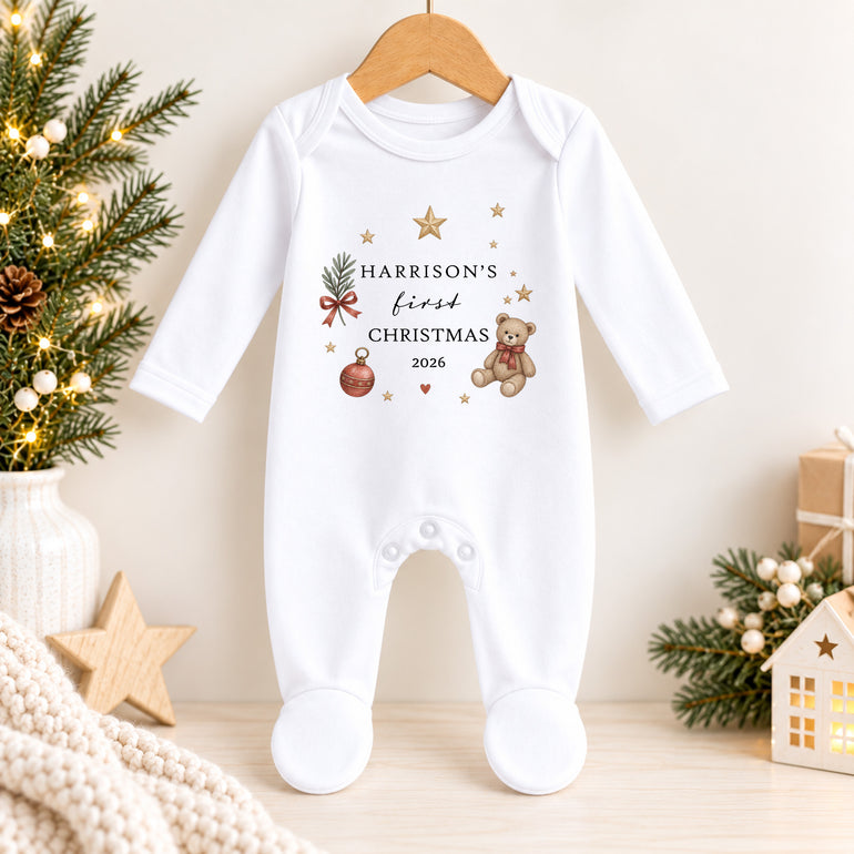 Personalised First Christmas baby grow with teddy bear, child’s name, chosen year, red bauble and festive stars