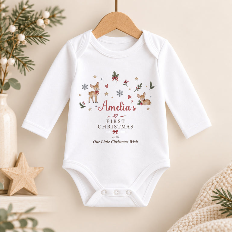 Personalised First Christmas baby vest with festive reindeer, holly and snowflake design, child’s name, year and Little Christmas Wish wording