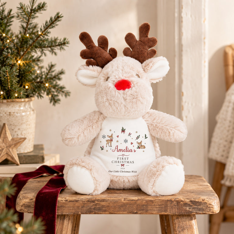 Personalised reindeer teddy with First Christmas name and year design featuring reindeer, holly, snowflakes and stars