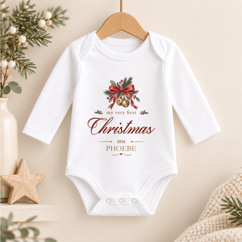 Personalised My Very First Christmas long-sleeve baby vest with gold bells, red bow, child’s name and year