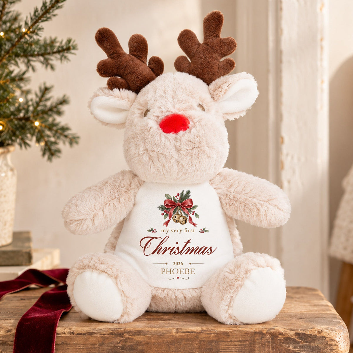 Personalised First Christmas reindeer soft toy with Christmas bells, red bow, child’s name and chosen year