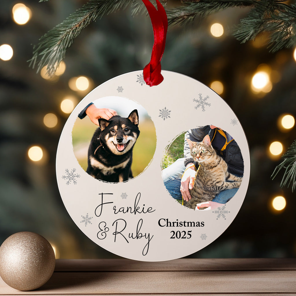 Personalised two-photo pet Christmas bauble with dog and cat photos, names and year, white acrylic ornament.