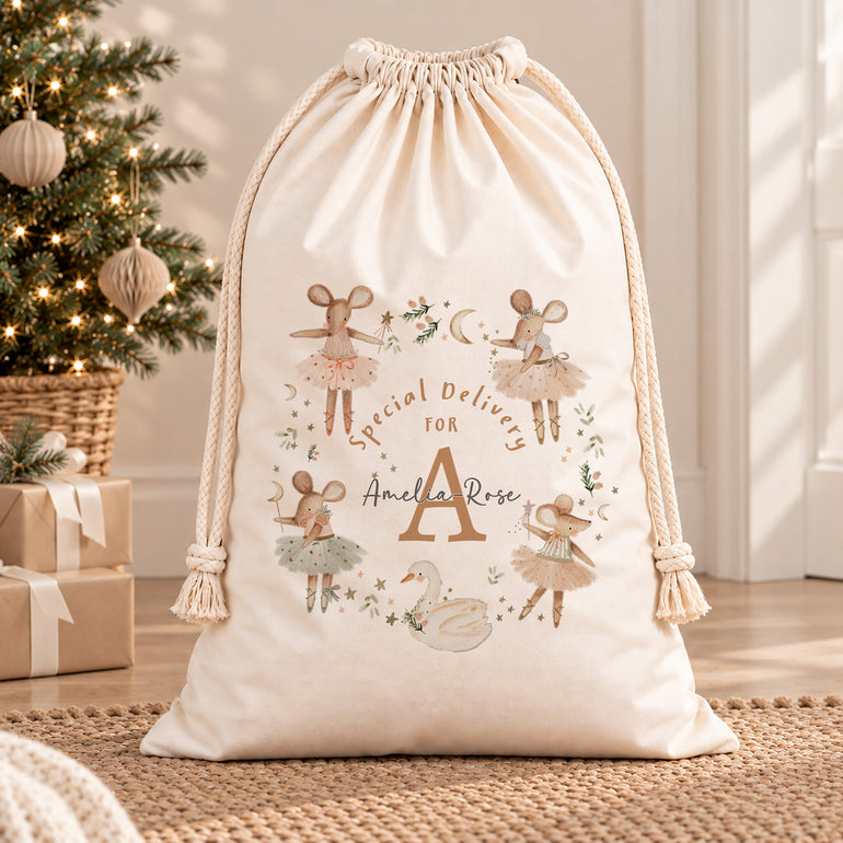 Ballerina mice and swan Santa sack with Special Delivery For wording and personalised lettering, shown in a festive room.