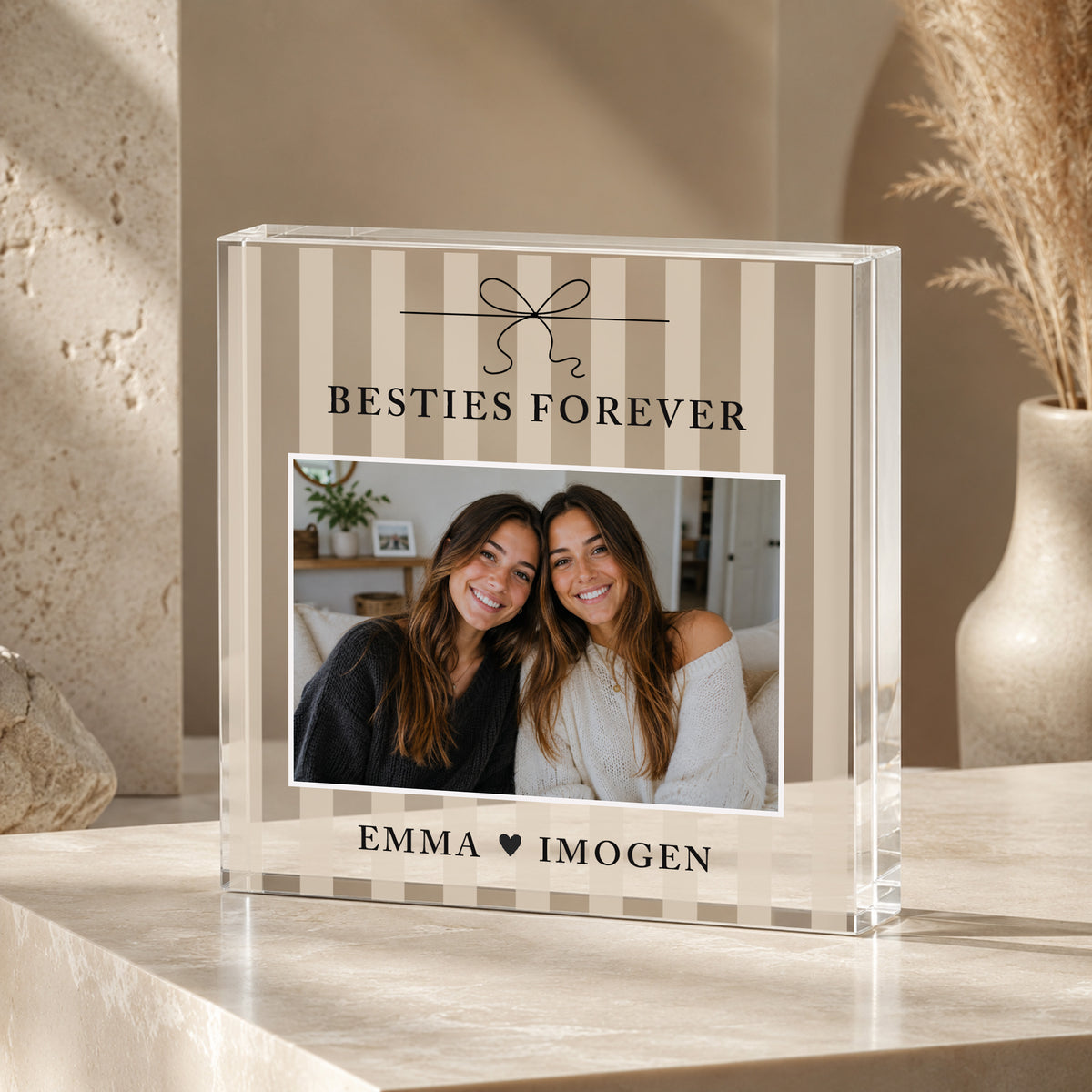 Beige striped personalised Besties Forever acrylic photo block with bow design, friendship photo and names Emma and Imogen.