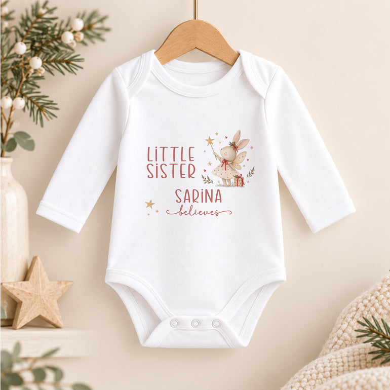 Personalised Little Sister Christmas baby vest with fairy bunny, child’s name and festive Believes wording
