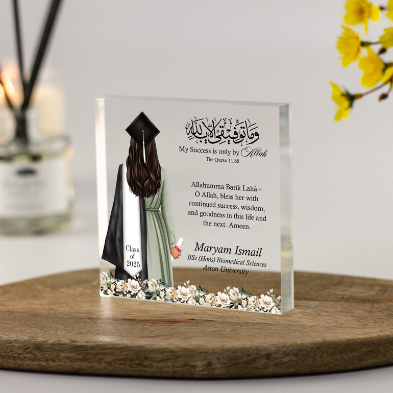 Personalised Muslim female graduation acrylic block with dua and Quran verse, illustrated with modest girl in gown holding diploma – freestanding keepsake gift.