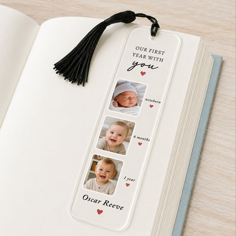 Personalised baby first year photo bookmark with newborn, 6 month and one year milestone photos and black tassel.