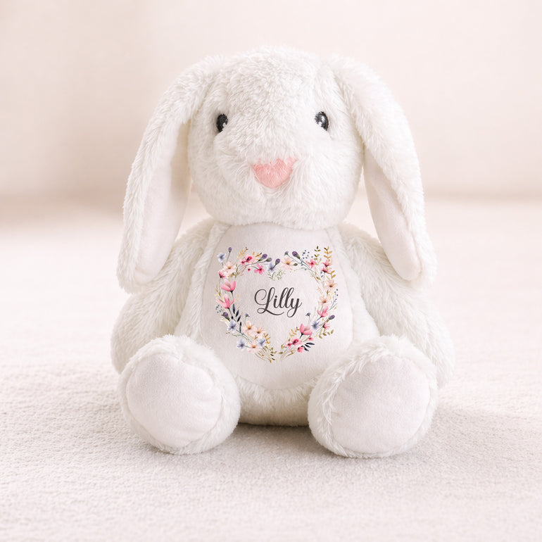 White plush bunny with floral design and 'Lilly' text on a light background