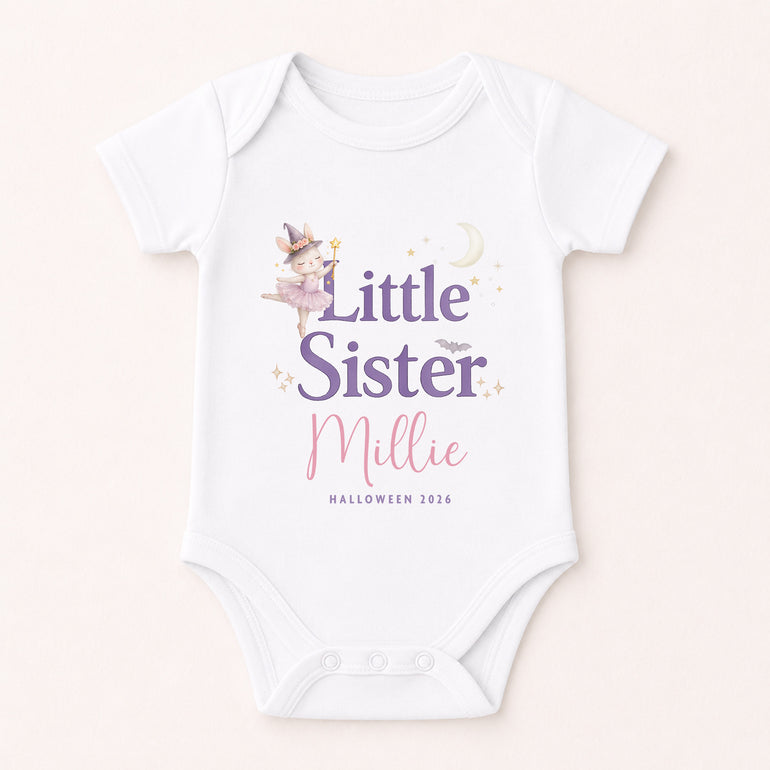 Personalised white Little Sister Halloween baby vest with the name Millie, purple lettering and a watercolour witch bunny design.