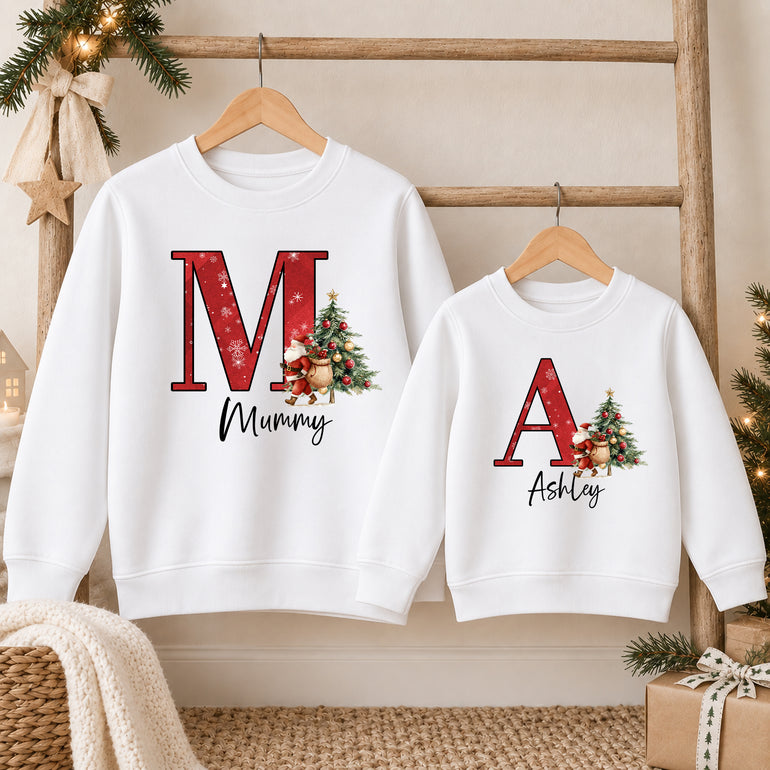 Custom Christmas jumper with a large red initial, Santa, Christmas tree and name, alternative view