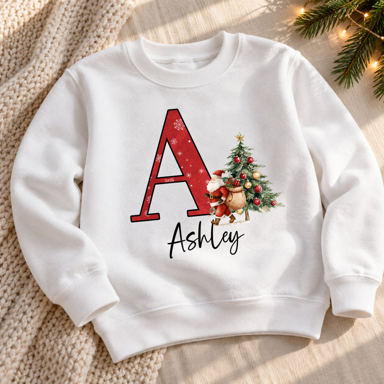 Custom Christmas jumper with a large red initial, Santa, Christmas tree and name, alternative view