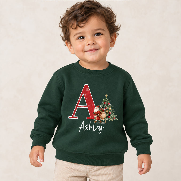 Custom Christmas jumper with a large red initial, Santa, Christmas tree and name, alternative view