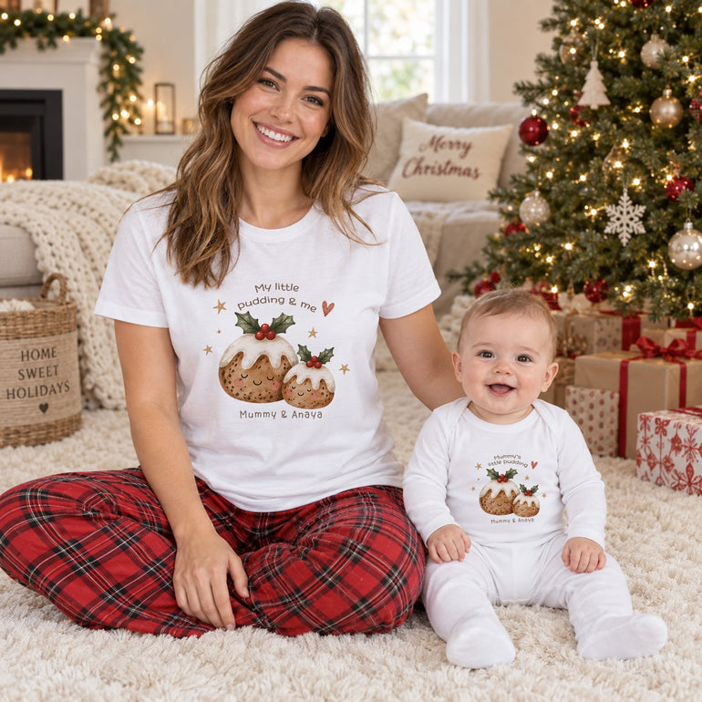 Mummy and baby wearing personalised matching Christmas clothing with Little Pudding designs and Mummy and child names