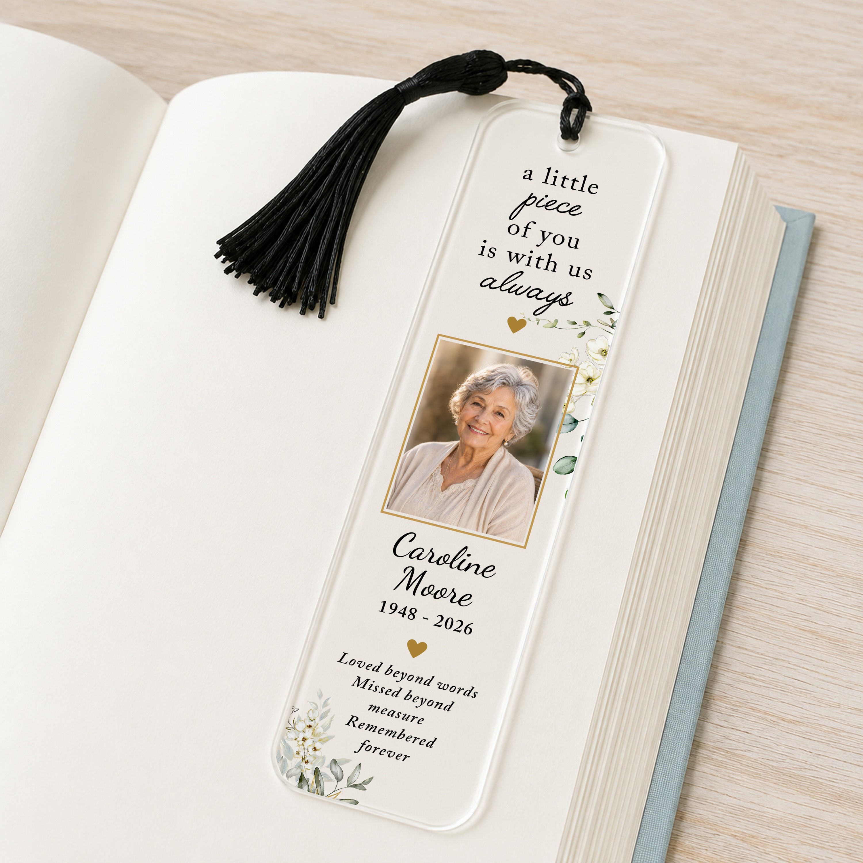 Personalised memorial photo bookmark with loved one's photograph, name, memorial dates, botanical flowers and black tassel.