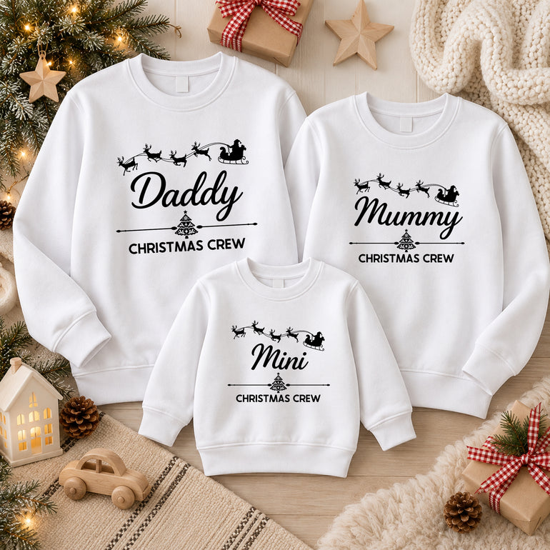 Mummy and Mini Christmas Crew matching jumpers with Santa's sleigh, alternative view