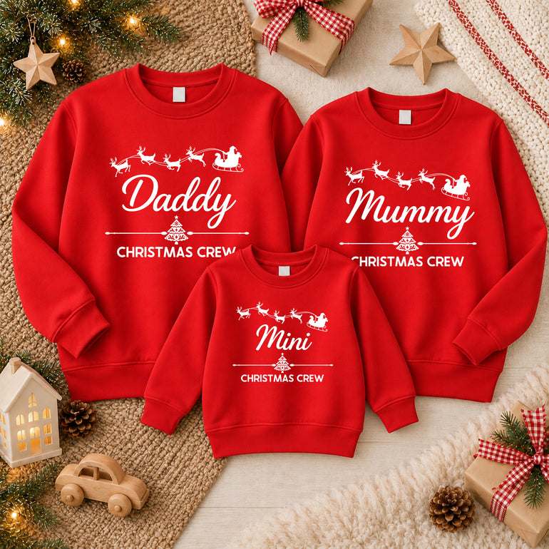 Mummy and Mini Christmas Crew matching jumpers with Santa's sleigh, alternative view