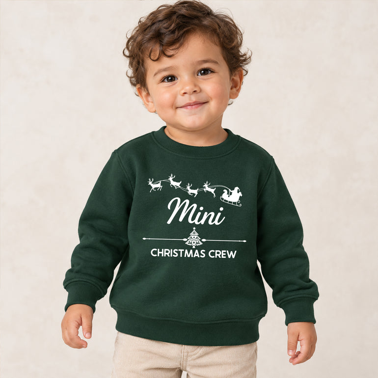 Mummy and Mini Christmas Crew matching jumpers with Santa's sleigh, alternative view