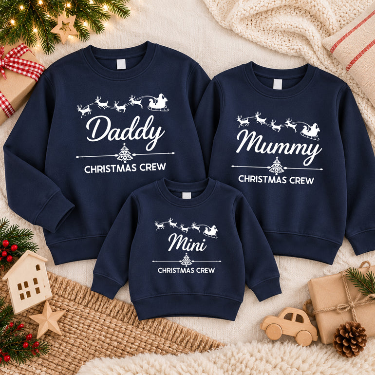 Mummy and Mini Christmas Crew matching jumpers with Santa's sleigh, alternative view