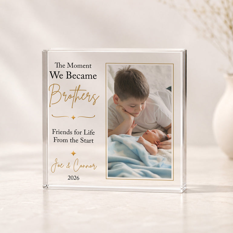 Personalised new brothers acrylic photo block featuring big brother with newborn baby brother, their names and year.