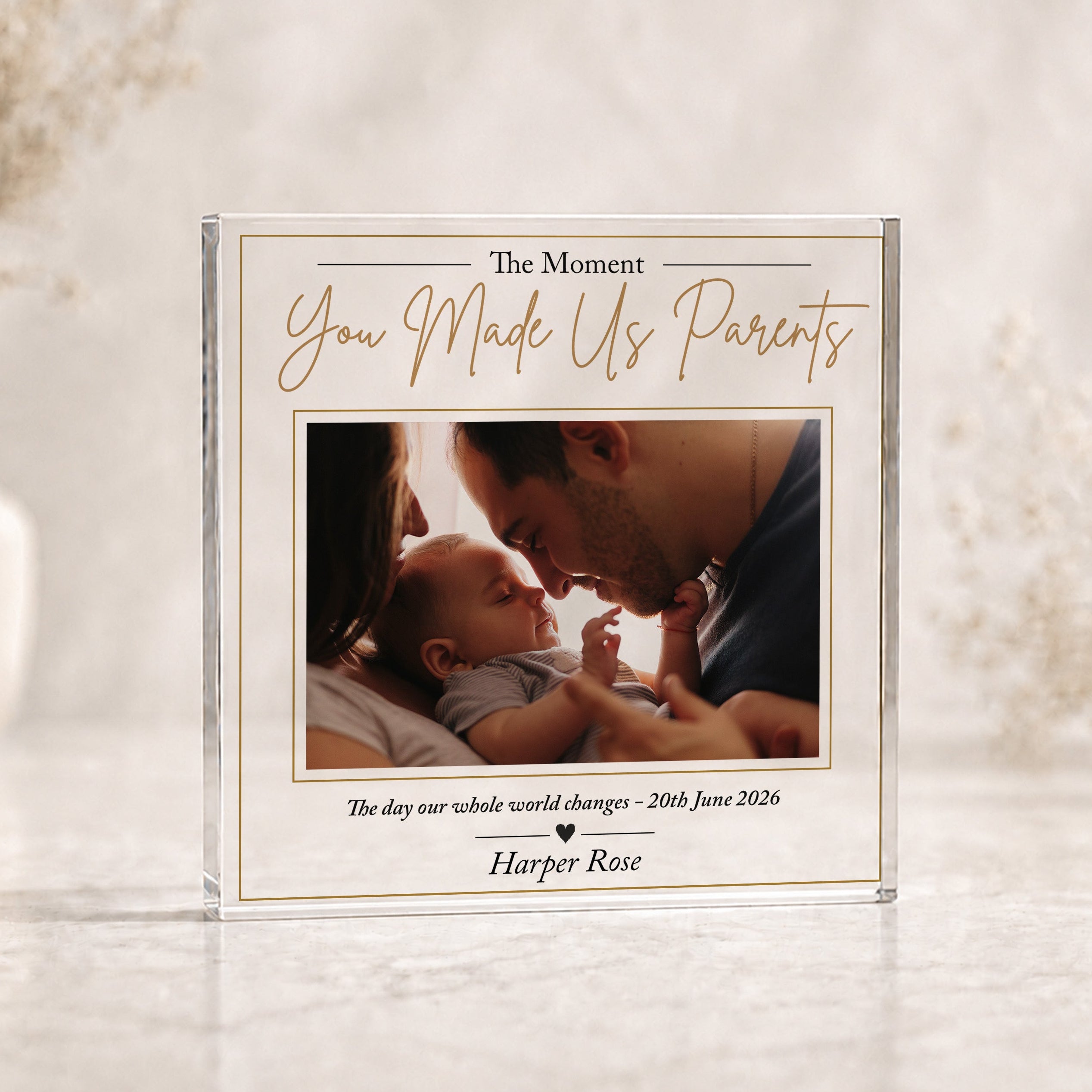 Personalised new parents acrylic photo block with mum dad and newborn baby photograph, baby's name and birth date.