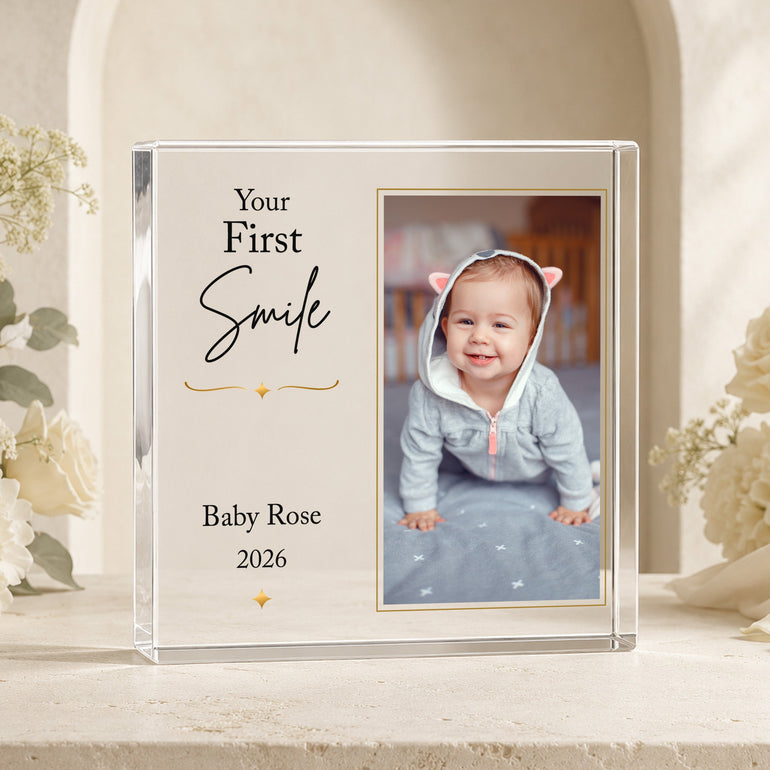 Personalised baby first smile acrylic photo block featuring baby's photograph, name and year as a milestone keepsake.